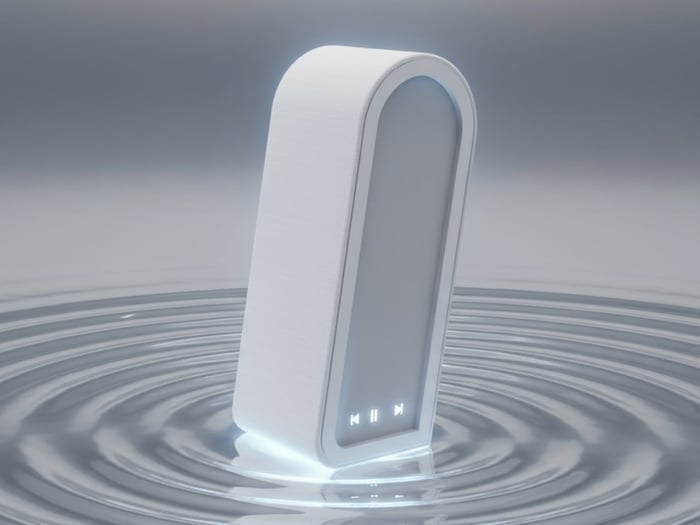 Sonique speaker standing tall like a small monument on a shelf