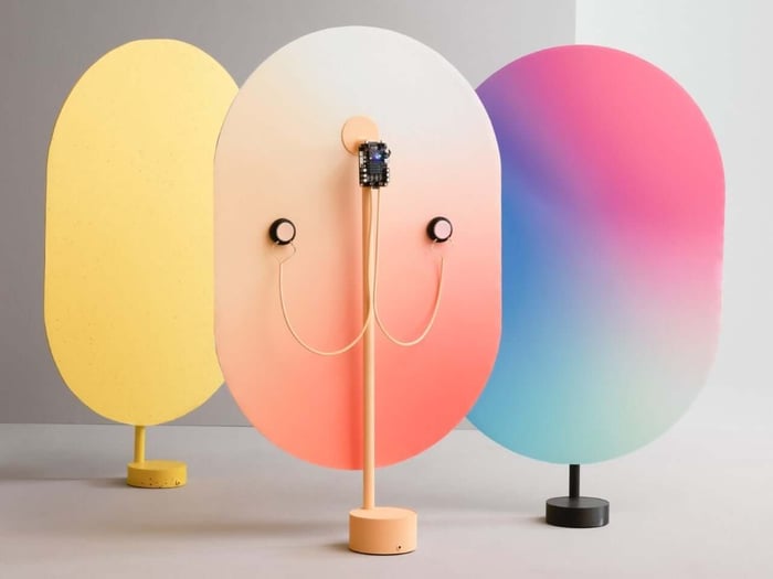 Minimalist flat-panel speaker blending seamlessly with décor.