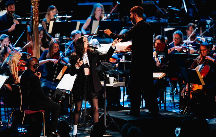 St. Vincent performing at an orchestral show, photo by Andy Paradise