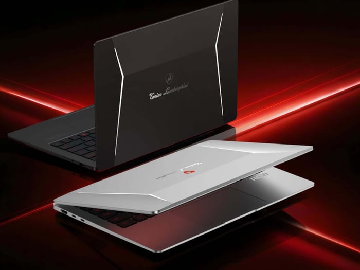TECNO and Tonino Lamborghini AIoT laptop and tablet concept showcasing red and gunmetal design