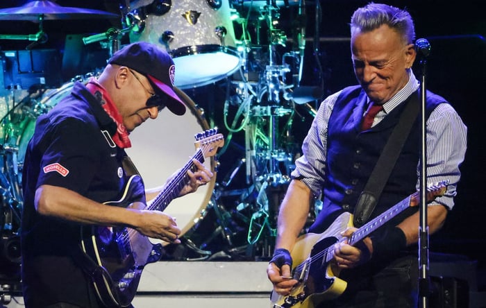 Bruce Springsteen performing with Tom Morello and the E Street Band