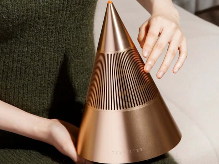Close-up of the cone-shaped Tresound Mini speaker highlighting its minimalist design