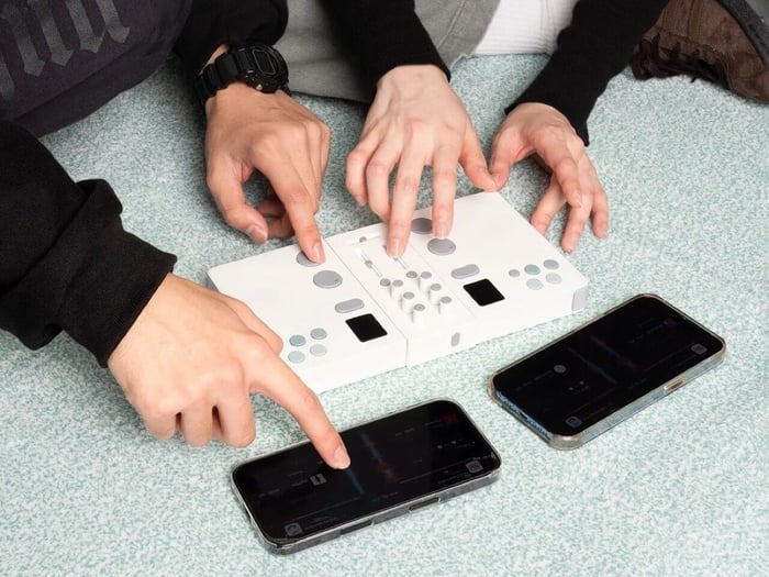 Center mixer section with EQ knobs and faders