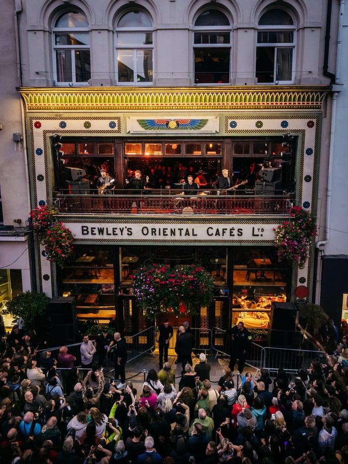 U2 performing on Grafton Street in Dublin