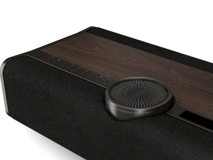 Side view highlighting wood veneer and fabric panels