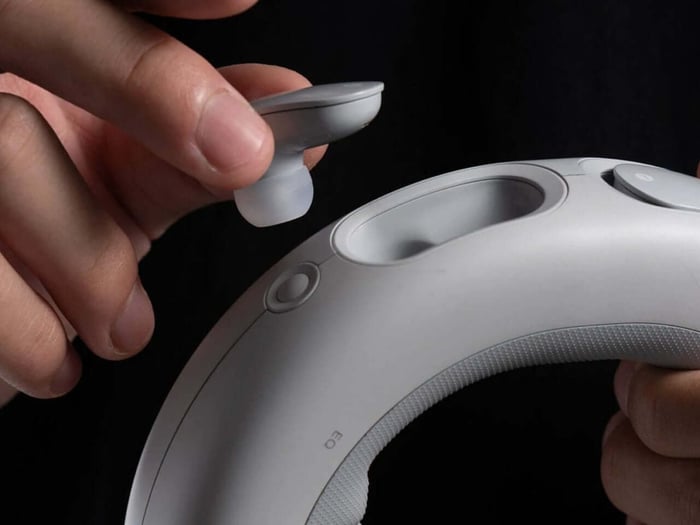 Minimalist design meets functional innovation in this circular audio device.
