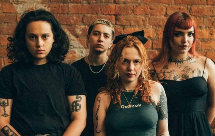 Witch Fever performing live, capturing the raw energy of their doom-punk sound.