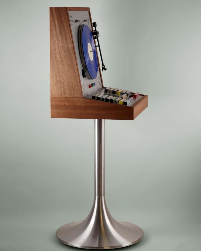 Cassette tape storage below turntable