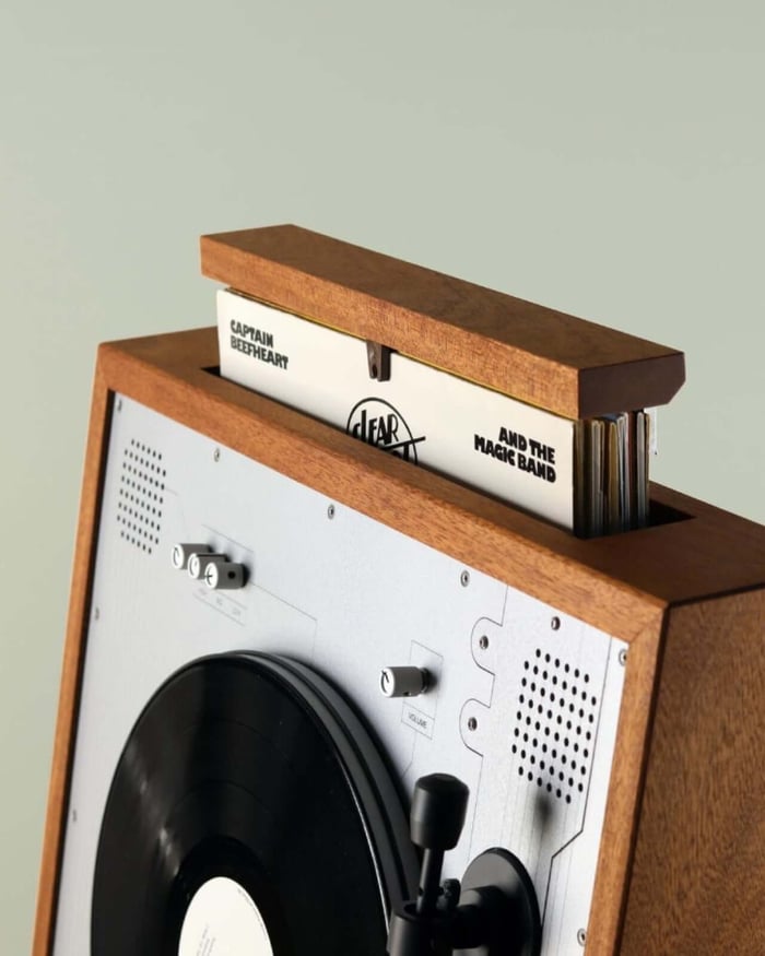 Wooden cabinet with vinyl and tapes