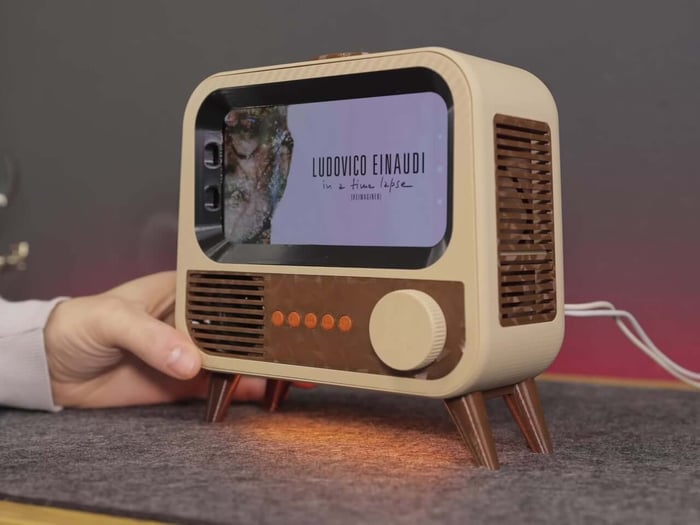 Close-up of retro TV speaker