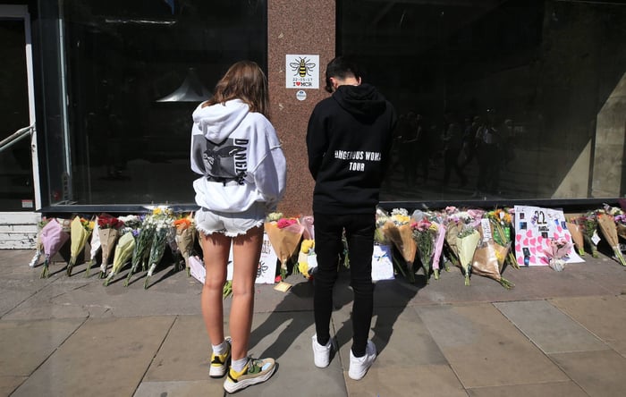Young people at a Manchester attack memorial