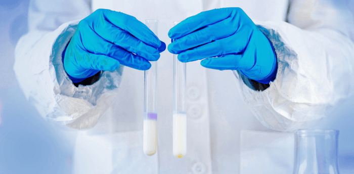 Scientist testing milk