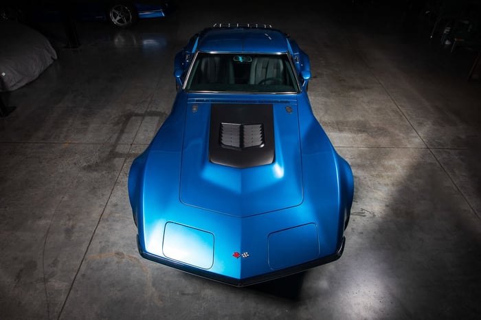 Nose-down view showing Corvette’s wide front track and planted presence.