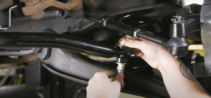 Detroit Speed tubular control arms installed for improved handling.