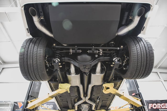 A close-up of the Detroit Speed QuadraLink suspension, designed to eliminate axle hop and maximize traction.