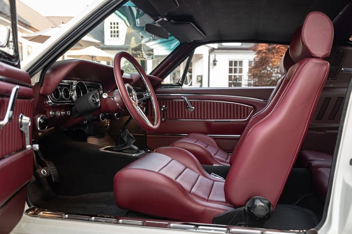 A view of the custom interior, featuring a Retrosound radio and Vintage Air A/C for modern comfort.