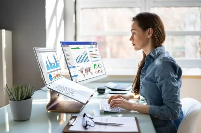 Female Student Working Project Management Certifications for Finance Professionals .