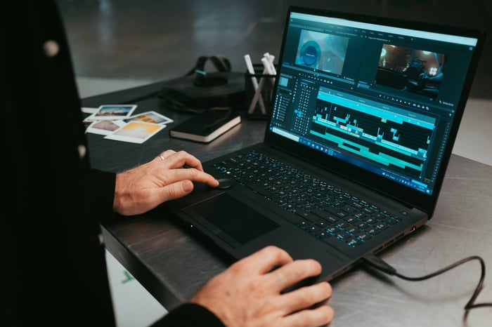 person editing - Video Editing AI Software