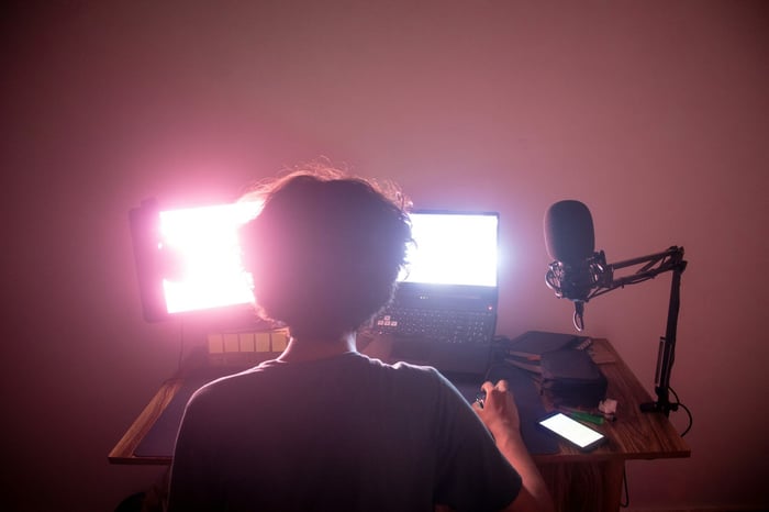 Person Using Computer - AI in Video Production