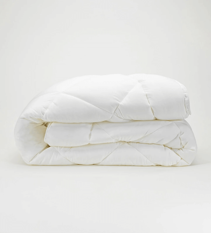 A white blanket on a white backgroundAI-generated content may be incorrect.