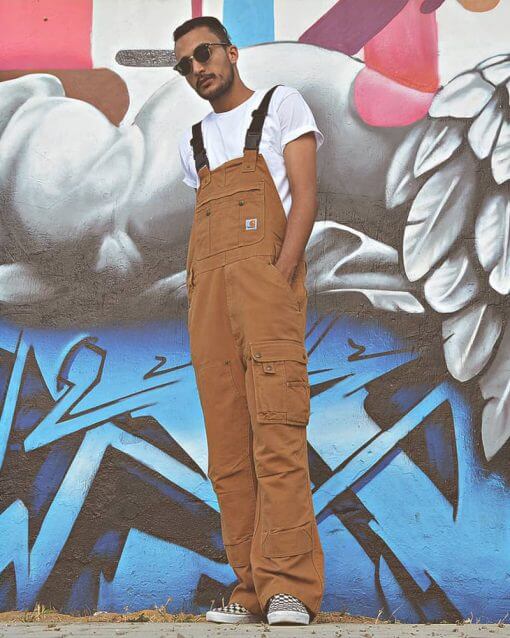 Man wears Carhartt Overalls