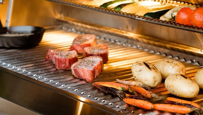 How to choose the right grill for outdoor cooking based on flavor, cost, space and fuel type