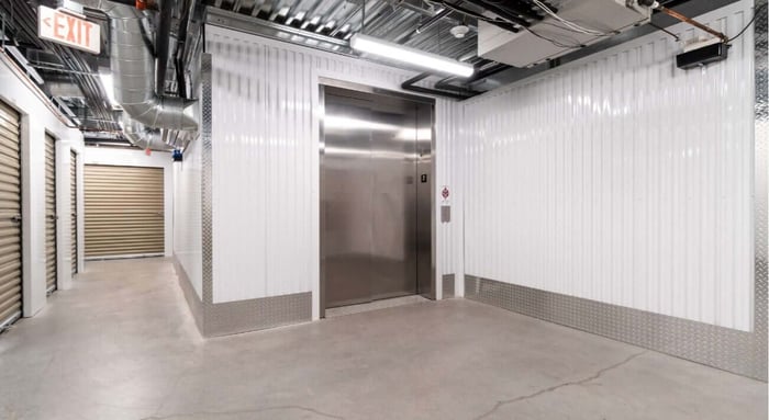 A row of secure, climate-controlled storage units at STORAGExperts in Scottsdale Arizona, highlighting the importance of insuring stored belongings.