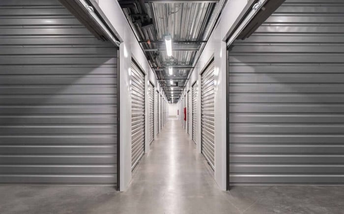 A view of indoor climate-controlled storage units at STORAGExperts in Scottsdale Arizona showing clean and secure hallways