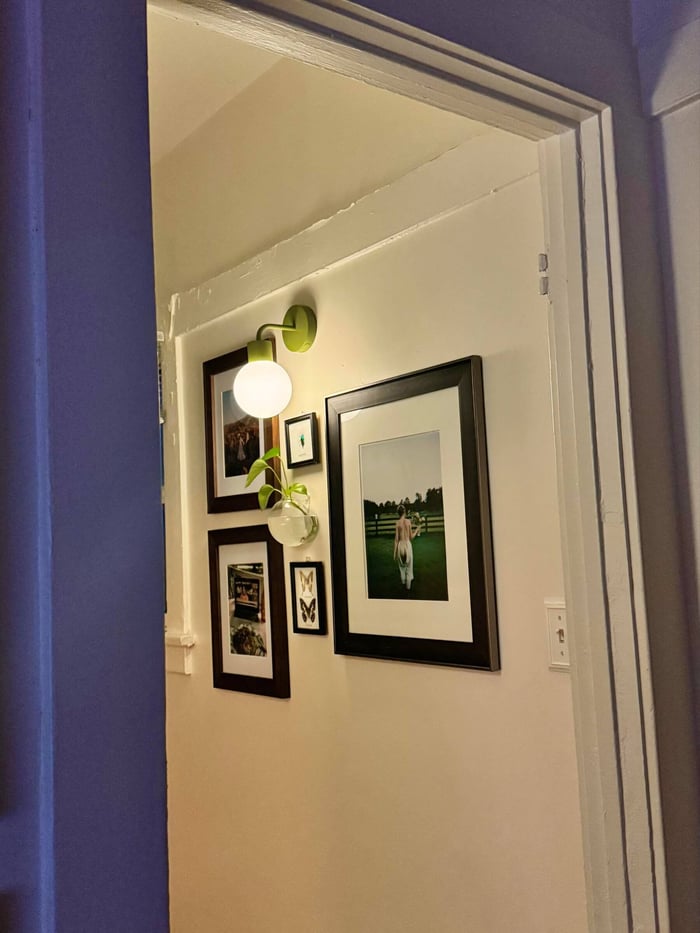 rechargeable-wall-sconce-on-gallery-wall