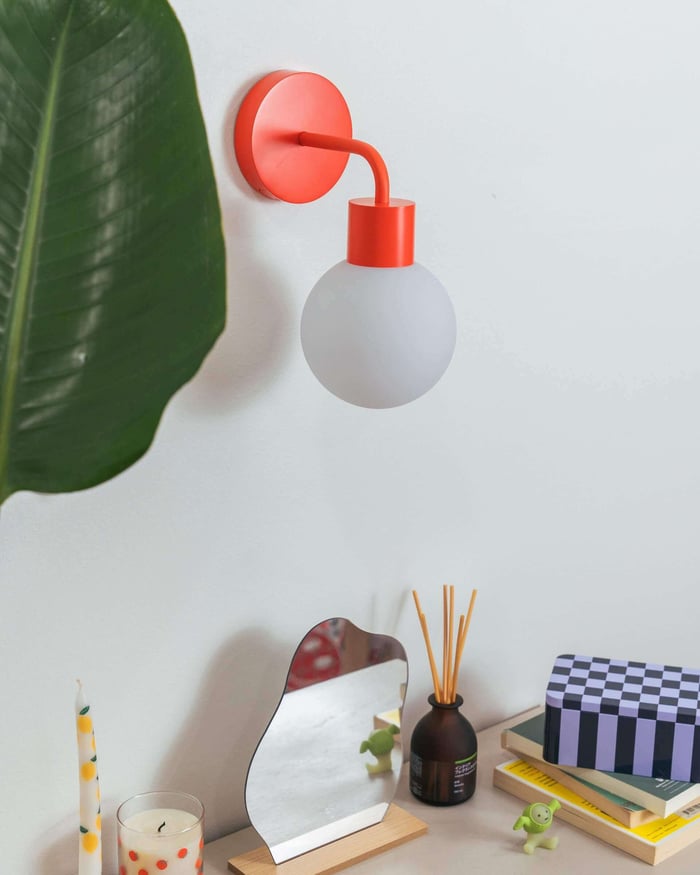 stick-on wall sconce in vermillion red