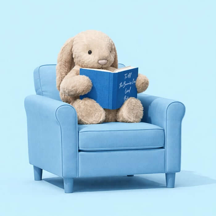 Bashful Beige Bunny on a couch reading To all the Bunnies I've loved before