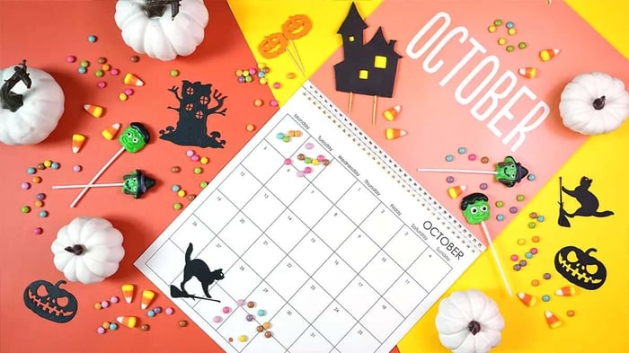 an october calnedar with ahlloween decorations