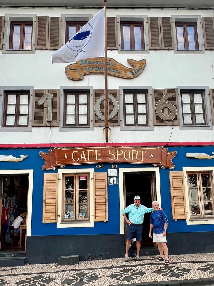 Guy Harvey standing outside Peter’s Café Sport in Horta, a famous bar for Azores blue marlin fishing crews.