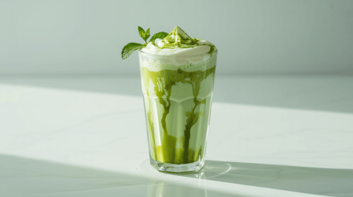 Collagen-matcha latte shake in a glass
