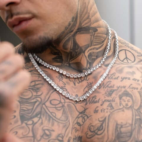 Adamans Tennis Chains On Male with Tattoos
