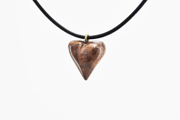 A Loving Alternative to Tree Carving: Hand-Carved Wooden Pendants from Rescued Wood