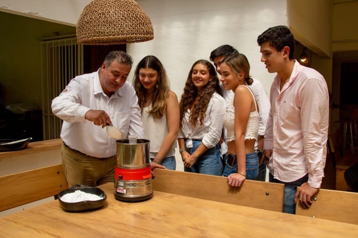 Jose and his chocolate fans watch on