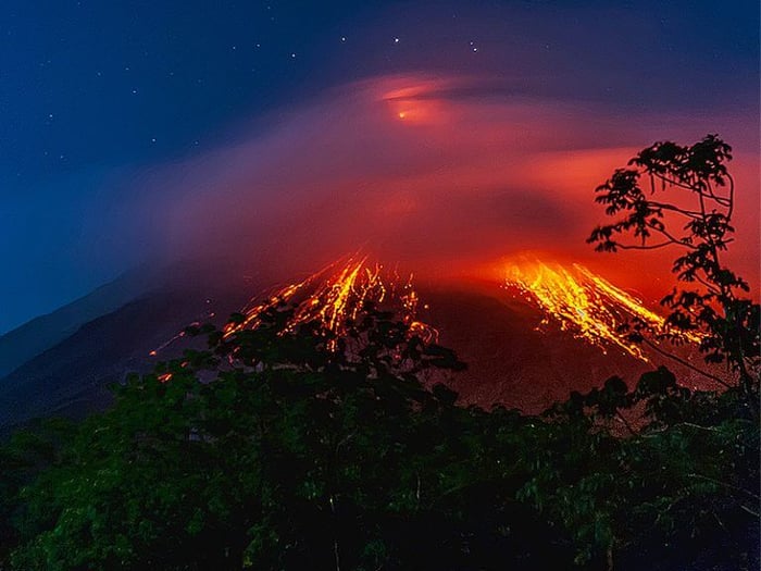 Night view of an eruption at Arenal