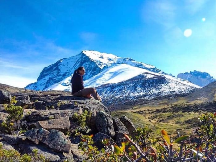 Pamela enjoys the view on a hiking stop