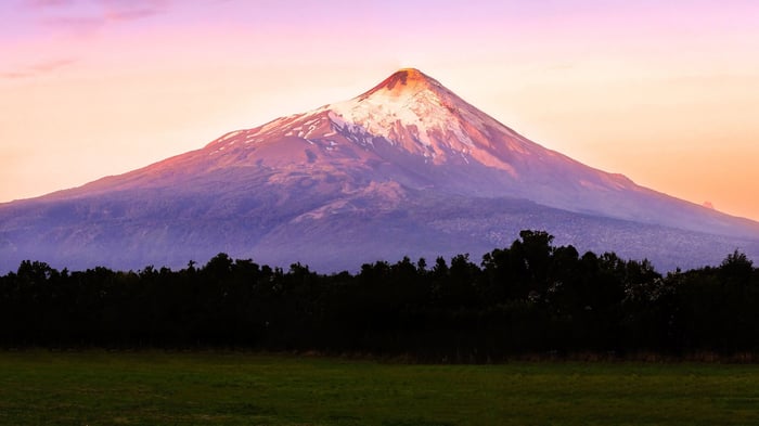 Beautiful landscape of the Osorno volcano against the sunrise sky background, Los Lagos, Chile