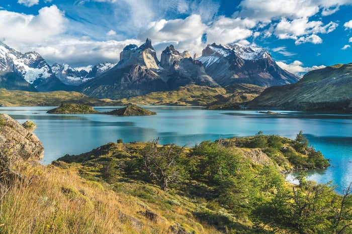 Torres del Paine Blue lake with snowy mountains