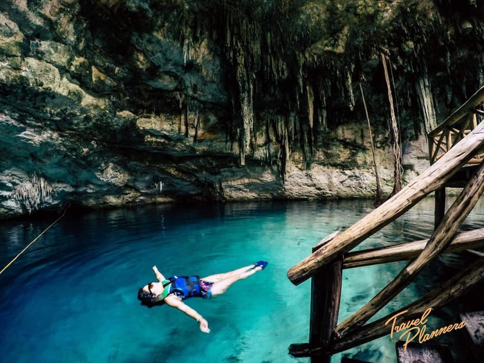 Mihaela floating in San Ignacio cenote