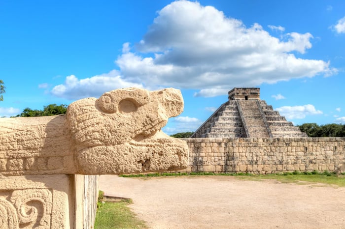 Chichen Itza Snake Head and Pyramid of Kukulcan in Yucatan Peninsula, Mexico