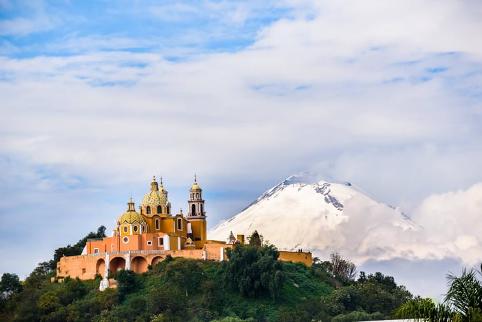 Cholula church with Popocatepetl volcano in Puebla Mexico