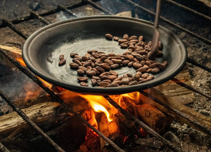 Ecuador cocoa beans on the fire