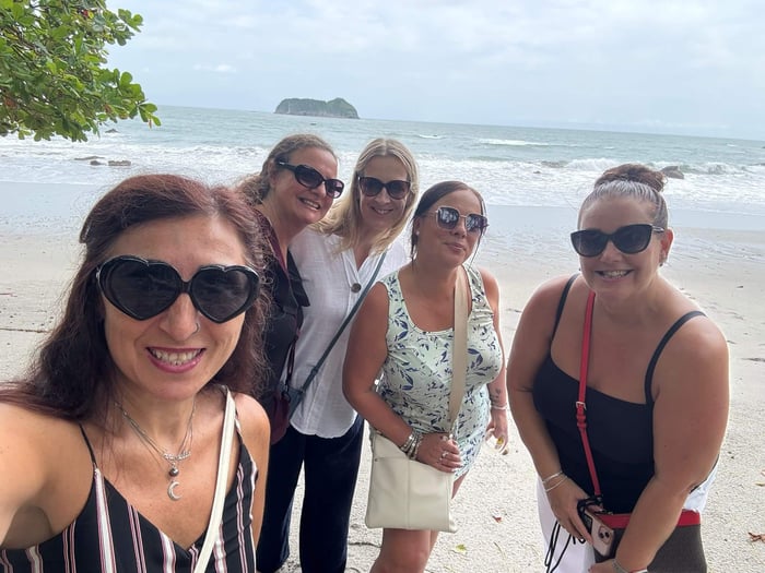 The group on the beach