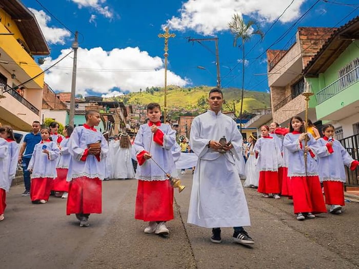 People walking in Holy Week procession, easter traditions in Medellin, Colombia