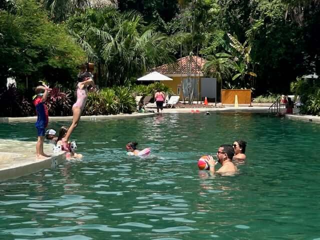Jess and her family enjoy the pool in Costa Rica