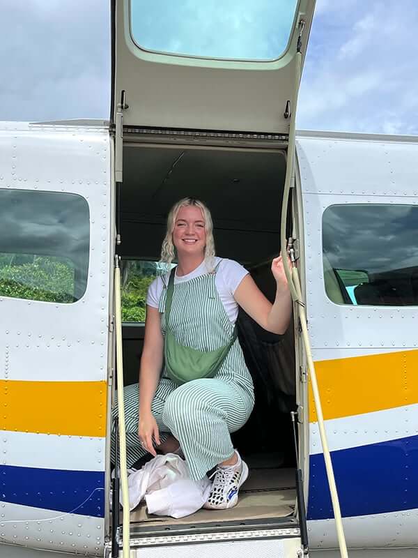 Lydia in a Sansa light aircraft