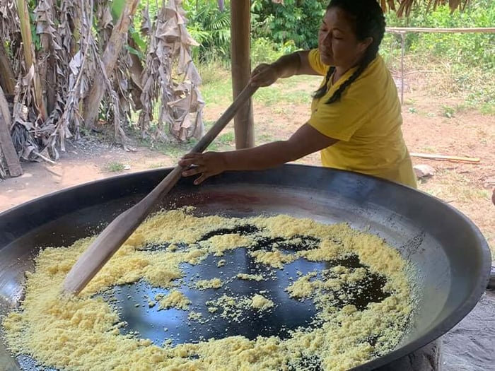 Cassava being baked to make Farine, a favorite dish among Guyana’s indigenous people